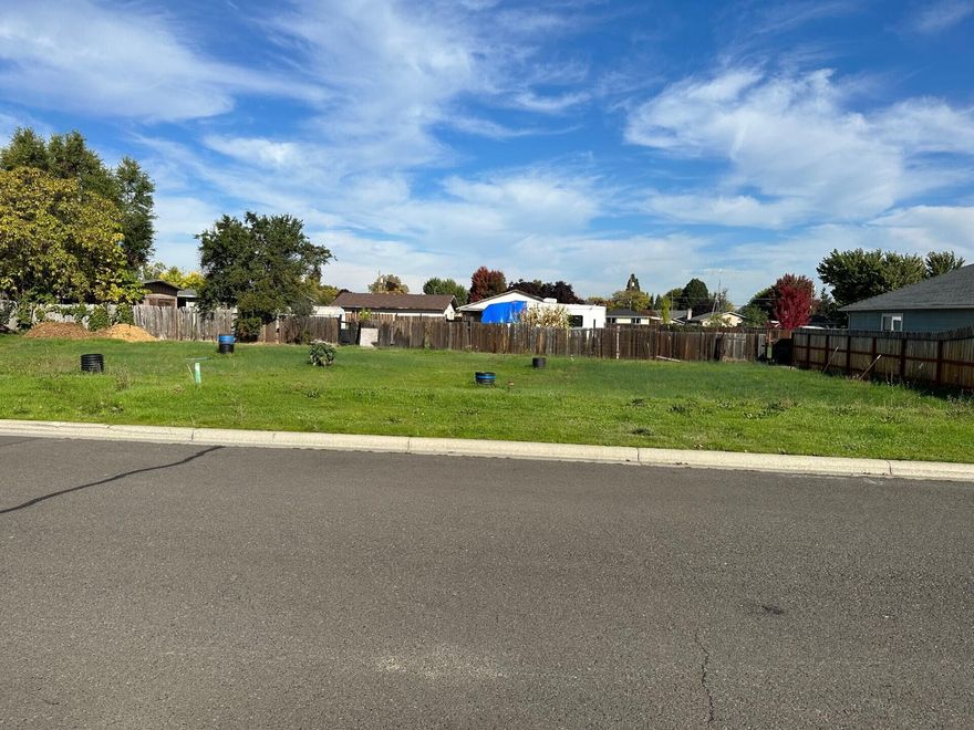 This may be the only duplex lot available on the market in Medford. Ready to go, this .19 care lot is located near newer duplexes in northwest Medford. The address says Connell Ave. But it is on Mellecker Way, to the west of 155 Mellecker, and across the street from 138 & 142 Mellecker.