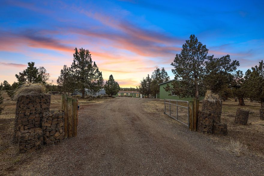 Nestled on 5.52 acres, this peaceful 3 bed, 2 bath home offers ultimate privacy and seclusion backed by 40 acres of public land. With incredible views and a serene setting, this property is the perfect escape from the hustle and bustle of everyday life.
Inside, you'll find a well-designed layout with distinct living areas for comfort and functionality. The spacious living room is ideal for relaxing or entertaining, while the kitchen offers plenty of cabinet space and a cozy dining area.
Step outside to experience the natural beauty that surrounds you. The property offers ample room for outdoor activities, with stunning views at every turn. Large shop provides space for hobbies, storage, or projects. A gated driveway offers security and peace of mind.
Enjoy access to Crooked River Ranch amenities, including a golf course, park, pickleball & tennis courts, pool, and snow removal. If you're looking for a quiet retreat with expansive views and room to roam, this property is a must-see!