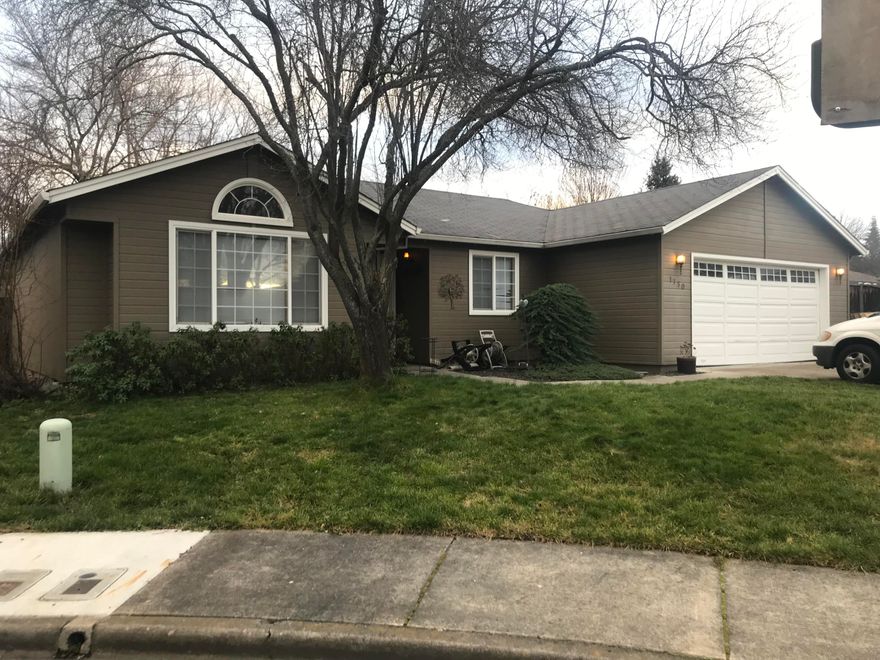 Rare find! Home located in the Lone Pine school district on a beautiful .21-acre lot.  This home is 3 bed, two bath home with updated Vinyl Plank flooring in the living room and hallways. This home offers a large backyard with a gravel area perfect for entertaining or an above ground pool.  Nicely landscaped yard with small RV parking next to the home.  Attached two car garage rounds out this beautiful home.