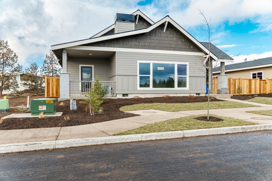 Ready for the New Year! Situated in NW Redmond just off the Dry Canyon, this home offers the craftsmanship & thoughtful design found in every Dunlap Fine Homes build. This expansive home ftrs spacious living spaces & over sized bedrooms & baths. Great Room layout w/attractive, open Kitchen featuring a central island that is every chef's dream! Plenty of prep space & storage, Quartz slab counters & full height backsplash. SS farm sink, gas range & dishwasher, pantry w/space for all your extras. Living space offers open concept living and plenty of room for gathering & cozy gas burning fireplace. Primary bedroom ftrs walk in closet, step in shower & dual vanities. 2 additional guest rooms w/ shared full bathroom. Laundry room is right off the primary bedroom. Durable wood look laminate flooring, carpet in the bedrooms & luxury vinyl plank in baths. Gas forced air, pre-wired for A/C, fully fenced & landscaped w/ triple car garage w/ ally access! Completed interior photos. Don't miss!