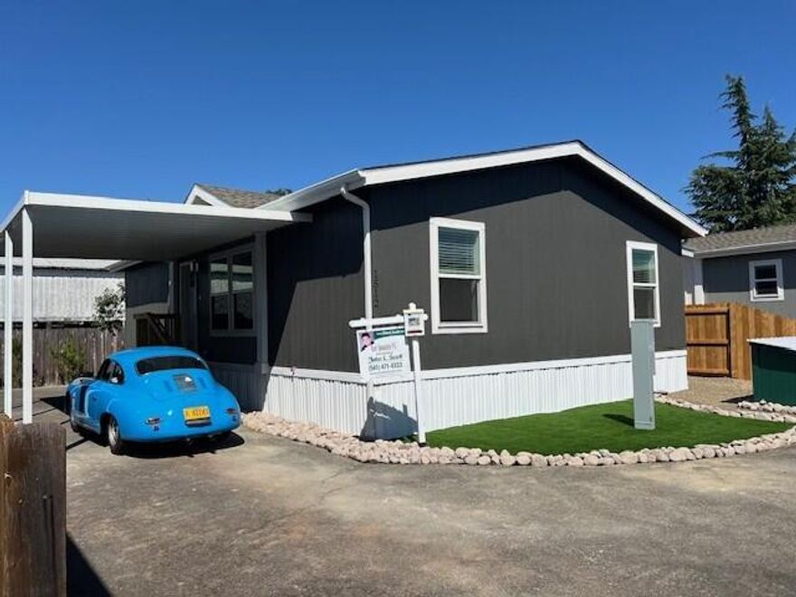 3 months FREE space rent @ approved sale price.  Charming Brand-New Manufactured Home.  Welcome to your dream home in this peaceful 55+ senior park! This manufactured home offers modern construction. Featuring an open concept layout, this home boasts a bright and spacious living area, perfect for relaxing or entertaining.  The kitchen is equipped with stainless steel appliances, ample cabinetry, and stylish countertops. The primary suite offers a tranquil retreat with generous closet space, while additional rooms provide versatility for guests, a home office, or hobbies. Enjoy year-round comfort with a high-efficiency heat pump, ensuring cozy winters and cool summers. Green Building Verification Type: ENERGY STAR Certified Homes. Outside, you'll find a single-car carport.  Potential Lease option.