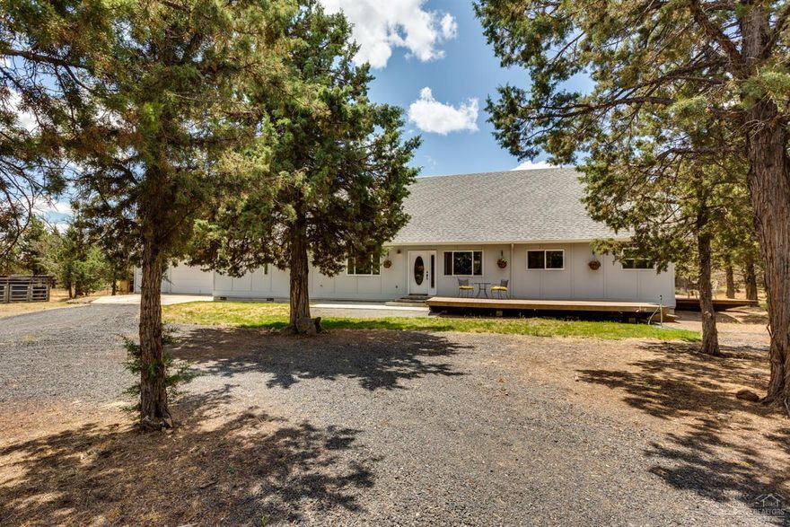 Turn-key small acreage with all the benefits of the CRR amenities. 2160 SF, 3 bed/3 bath home, w/French doors entering onto additional 2200 SF of outdoor living space, perfect for entertaining or relaxing, giving center stage to the expansive composite decking w/hot tub & lrg pergola. Vaulted ceilings & sky-view windows allow natural light to fill the rooms. Open concept design cohesively combines living, kitchen, dining & family room. Master en-suite features lrg walk-in closet, stall shower, clawfoot soaking tub, exterior entrance & privacy from guest rooms. Heat pump provides central-air/heat, w/certified Lopi wood stove as auxiliary heat source. Large utility provides 3rd bath/mudroom & access to 720 SF garage. Exterior is freshly painted, new septic tank installed & fencing added to define yard & add a sense of privacy. Wonderful opportunity to bring your animals, w/chicken coop & fencing. RV hookup for visiting friends & greenhouse to get a jump on your garden.
