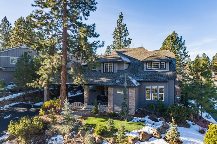 Artistically designed, this beautiful home is a modern dream. The creative style, with high end finishes and accessorizing produces a sophisticated, yet fun and cheerful space. Major renovations done 4 years ago is why this home feels so fresh and new! The interior is bright and light. An open and spacious kitchen/family room is the heart of the home with a large fireplace serving as its focal point. The kitchen is efficiently designed w custom cabinetry, stainless steel appliances, and white quartz waterfall island/eating bar. A separate living room is a great place to chill or have an office. Upstairs all bedrooms are nicely appointed. The master en-suite is spacious with a luxurious shower & dressing room complete w radiant floor heat.  An attached studio /guest quarters above the garage has a full bath. Situated in the coveted neighborhood of The Parks in NW Bend close to the Old Mill, Phil's Trail, Tetherow and great walking trails. This home is a must see!