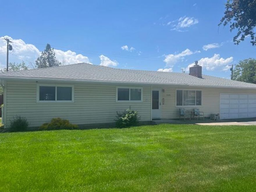 Charming Home on a Beautiful Tree-Lined Street. Discover this wonderful residence offering 1,722 square feet of comfortable living space in a desirable neighborhood. The home features 4 bedrooms & 2.5 bathrooms, making it perfect for families or those needing extra space. Inside, you'll find a welcoming living room with a cozy gas fireplace, ideal for relaxing evenings. The open dining area seamlessly connects to the family room, creating a versatile & inviting living space. Comfort is assured with gas forced air heating & central air conditioning, ensuring year-round comfort. Step outside to a large fenced backyard, perfect for outdoor entertaining or play. The backyard includes a deck, a storage shed & a small outbuilding—ideal for hobbies or storage. Additional amenities include sprinkler system in the front and back yards, an attached garage & plenty of room for RV parking. This charming home combines comfort, functionality & outdoor space-all on a picturesque tree-lined street!