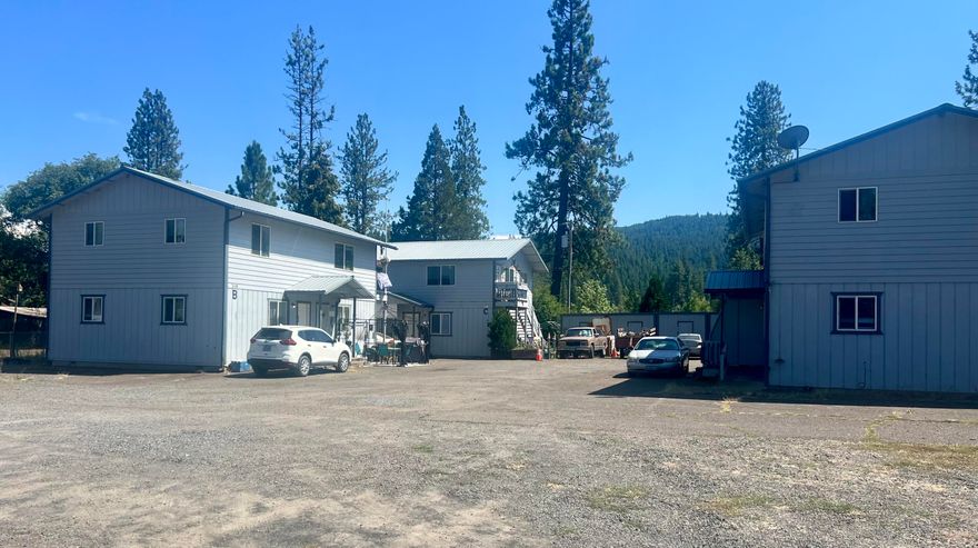 Well-maintained 9-unit multifamily property in the heart of Butte Falls. Built in 2002, totaling ±6,200 SF across three two-story buildings on an ±18,730 SF lot. Units are 2-bedroom/1-bath, each with separate gas and power meters. The complex is composed of 3 buildings with 3 two bedroom and six one bedroom units. All units have a storage shed.  Large open parking area. Professionally managed with 8 of 9 units occupied; several tenants have been in place for over a decade, reflecting strong retention.  No HOA fees. Located in a quiet rural setting with access to local services, schools, and outdoor recreation, this property provides stable income and room for future rent growth.