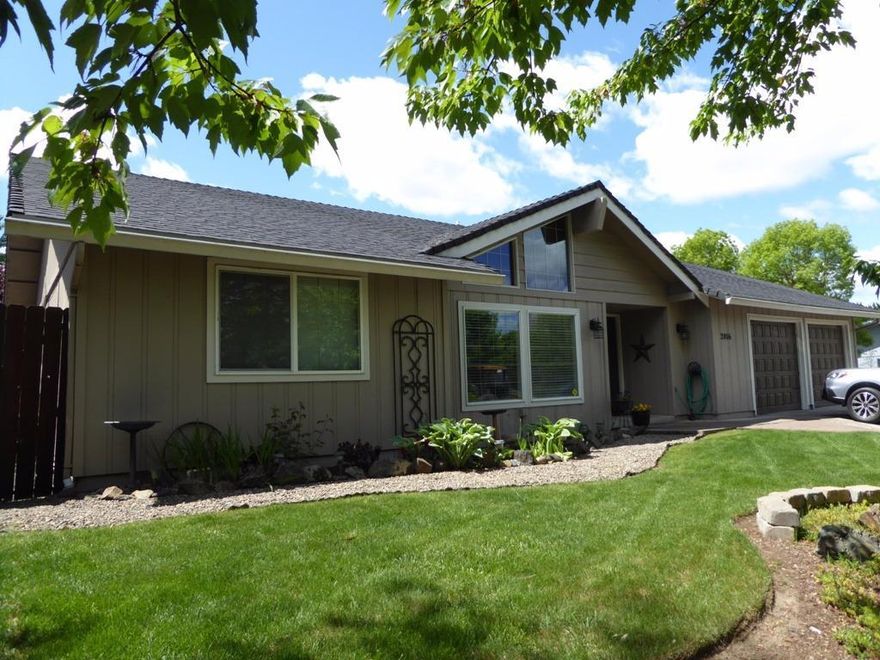 This is a very nice, well maintained East Medford home. The formal living room has vaulted ceilings and large windows for a light and airy feel. The family room features a gas fireplace and custom accent windows. You will love all of the storage the kitchen has to offer along with the solid surface countertops and stainless steel appliances. The formal dining room has a window that has a nice view of the backyard. There are 3 good size bedrooms and 2 baths, beautiful laminate floors and a large laundry room. The backyard has a stone patio area, rock paths and green grass. The she shed'' is a great place to get away for a quiet retreat! There is a covered patio across the back of the house, a 2 car garage and a garden shed. If you add a gate in the backyard, you could have room for a RV!