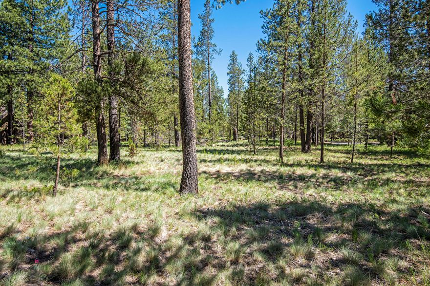 Opportunity awaits to build your dream home in Sunriver.  Located in the heart of Sunriver, this .29-acre pie shaped lot sits away from the road in the back of the cul-de-sac. Follow the common space in the back to Cardinal Landing Bridge and the Deschutes River.  Why hassle with competitive bids to purchase a property in need of updating and repair, when you can build to suit all of your needs.  The SHARC assessment is paid in full.
