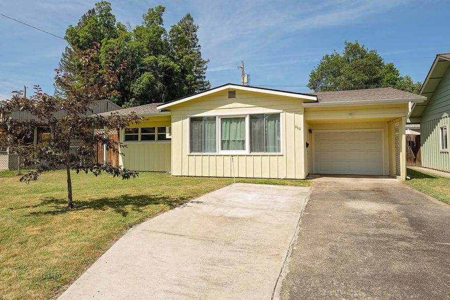 2 bedroom, 1 bath cottage on a low traffic, dead end street. This home has an amazing backyard, with a covered patio, fruit trees and a garden shed.  There is room for your vehicles/toys with a 1 car attached garage, separate approx 19x19 garage/shop in the back and extra parking in front. Inside you will find a new front door, fresh paint, new carpet an updated kitchen and a double closet in the main bedroom. Come and take a look!
(Per Medford School District website, this home will be in the new Oakdale Middle School boundaries)