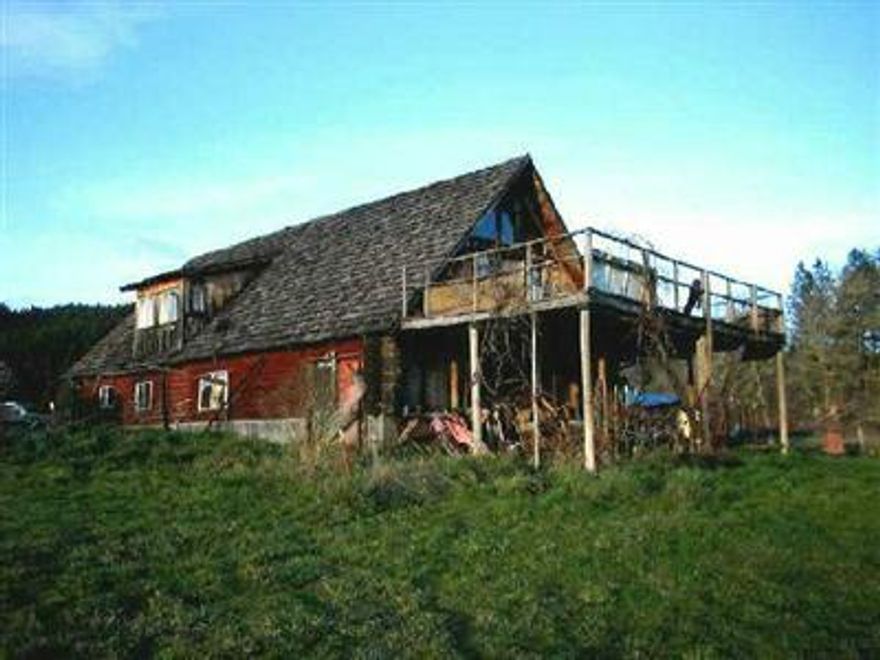 Perfect Property For Mini-ranch W/Log Home. 7.1 Acres Of Level Land, Open Pasture, Fruit Trees, Evergreens In The Back, Fenced And X-fenced, Hay Barn, Green House & Shed & Deck. Seasonal Creek Runs Through The Property. Backed By Blm. Home Needs Tlc.