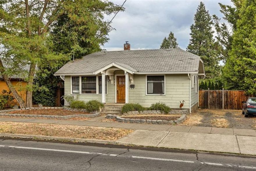 Sweet, 2+ bedroom, 1 bath bungalow next door to one of the best coffee shops in Ashland. Just a short distance to downtown Ashland, you're sure to appreciate this convenient Historic District location. Lots of original charm throughout including a sweet, tiled kitchen, oversized wood windows and distressed wood floors, service porch and plaster walls. The lower level basement is a nice surprise and offers additional living space plus a huge laundry room. In addition to lots of off street parking there is also a newer detached two car garage. Spacious, fenced backyard.