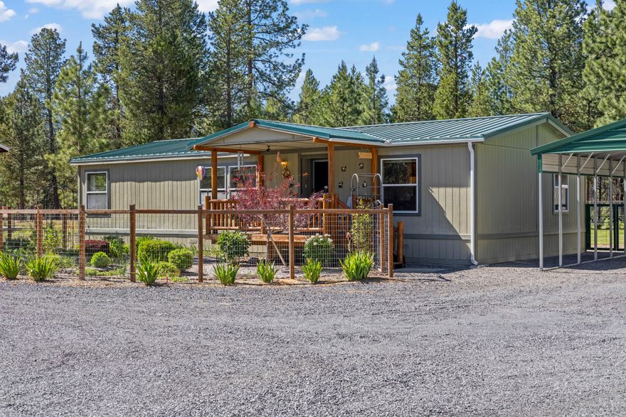 Welcome to your dream home! Nestled on almost 1-acre, this charming manufactured home offers the perfect blend of comfort and nature and surrounded by beautifully landscaped gardens. 
Step outside and discover the beauty within 20-30 minutes to multiple nearby lakes, hikes and popular Mt Bachelor. Find adventure right outside your yard to the La Pine State Park, offering endless opportunities for exploration and wildlife viewing.
Inside, the home features an open floor plan, spacious rooms, natural light and a cozy pellet stove for the cool evenings. Measurements on floorplan are estimates, buyer to do due diligence.