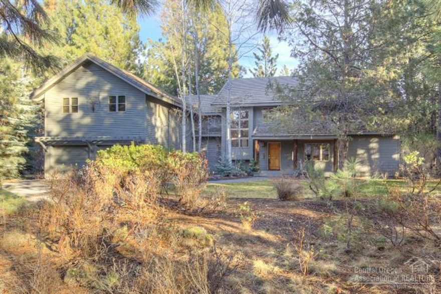 This is your chance to own over half an acre in the tranquil and sought after Sunrise Village. This home was beautifully custom built in 1993 with meticulous wood work throughout. Gorgeous high windows allow views into the private and huge backyard. Close to the Deschutes River, Pool and clubhouse with trail access throughout the neighborhood. One of the closest neighborhoods to Mt. Bachelor and just across the street from the newly completed Tetherow Hotel and Golf Course3. Huge bonus room over garage.