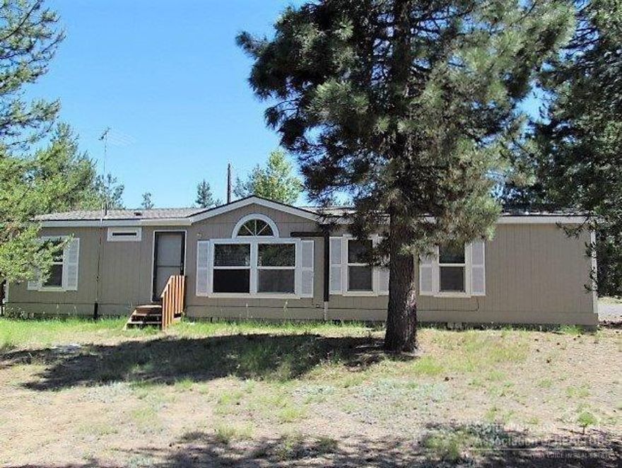 Charming and Peaceful Home on 2.27 acres. Wonderful 3 Bedroom + Den, 2 Bath, Formal Dining Room, Breakfast Nook and Utility Room. Single Car garage with shop area. Very Nice Area. New Counter Tops, sinks and fixtures. Newer roof and interior & exterior paint. RV Dump.