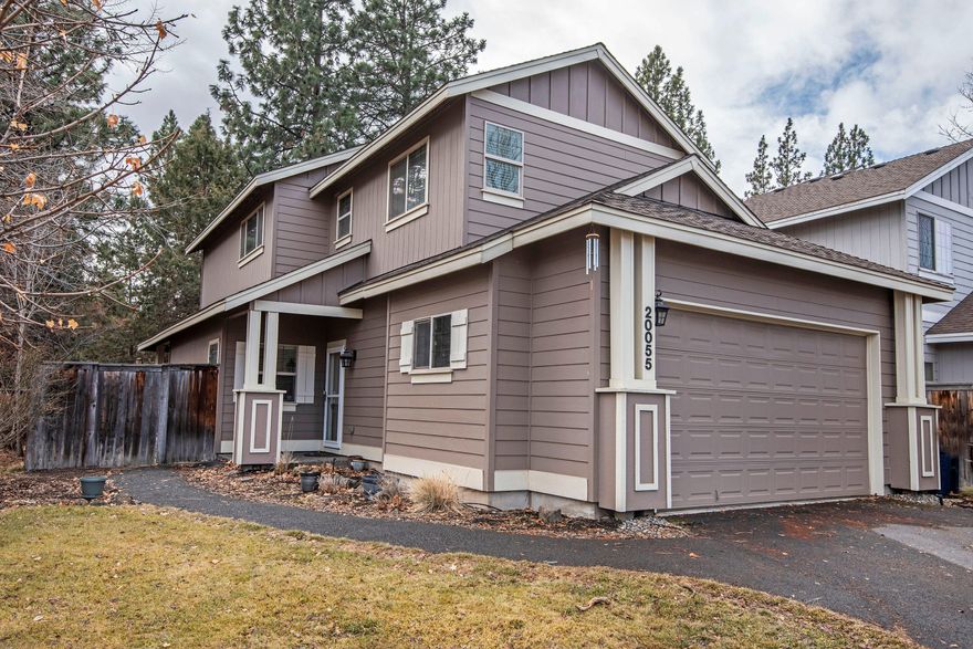 Located on a quiet street in a wonderful SW neighborhood with close access to schools, parks and trails; this home features a great room floor plan with a main level office plus an upstairs bonus space in addition to 3 generous sized bedrooms. The open floor plan features a cozy gas fireplace, large kitchen with granite counters, overlooking a beautiful wooded setting, lots of cabinet space, breakfast bar, pantry and stainless steel appliances - great for entertaining, upstairs laundry room, newer carpet and wood laminate floors throughout. Easy access to the parkway and the Old Mill District too.