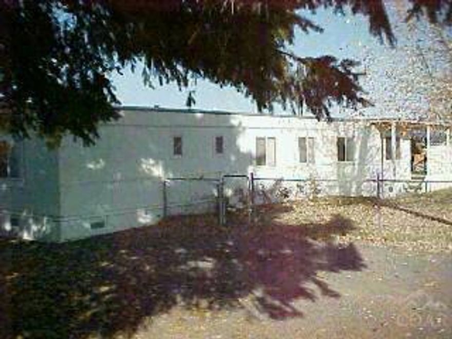 A Well Maintained 1979 Model Oakbrook Home With Tip Out On A Large Lot With Sewer & Close To Town. 10x12 Wood Frame Storage Shed & A 10x16 Carport Presently Rented At $400/Month. Plus Sewer And Water. //