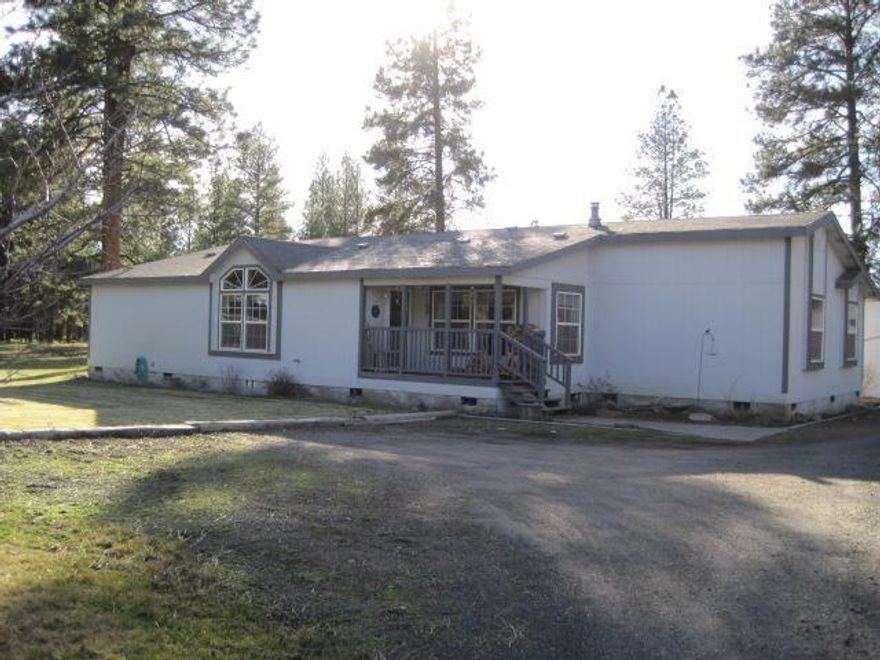 Very Nice Tree Studded Level 4.50 Acres, Lots Of Square Footage,900 Square Foot Garage/Shop,384 Sq Ft Detached Hobby Room 720 Sq Ft Barn, 140 Sq Ft Pump House,. Needs Tlc, Being Sold As Is, Roof Leaks. Nice Area Of Homes On Acreage.