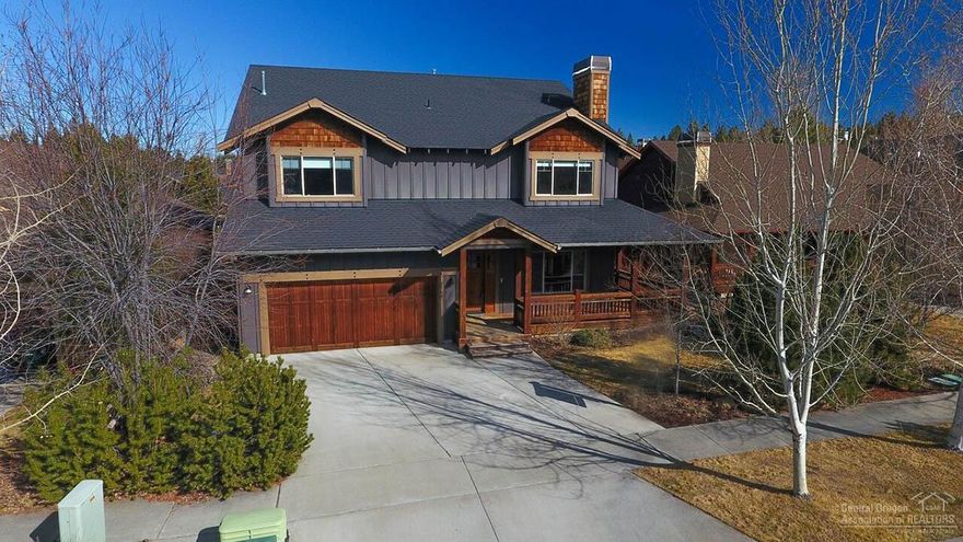 Superb NW Bend location boasts craftsman style home of simple elegance. Fireplace graced living room located close and open to country kitchen and family room, complimented by slate and hardwood floors, granite tiled counters, walk in pantry & powder room. Four bedrooms, 3 baths, master includes tiled bath & soaker tub, possible 2nd master w/bath! Den/office could convert to 5th bedroom. Gas heating, A/C, newer dishwasher, wood wrapped windows, solid home. Enjoy great access to covered wrap-around porch.