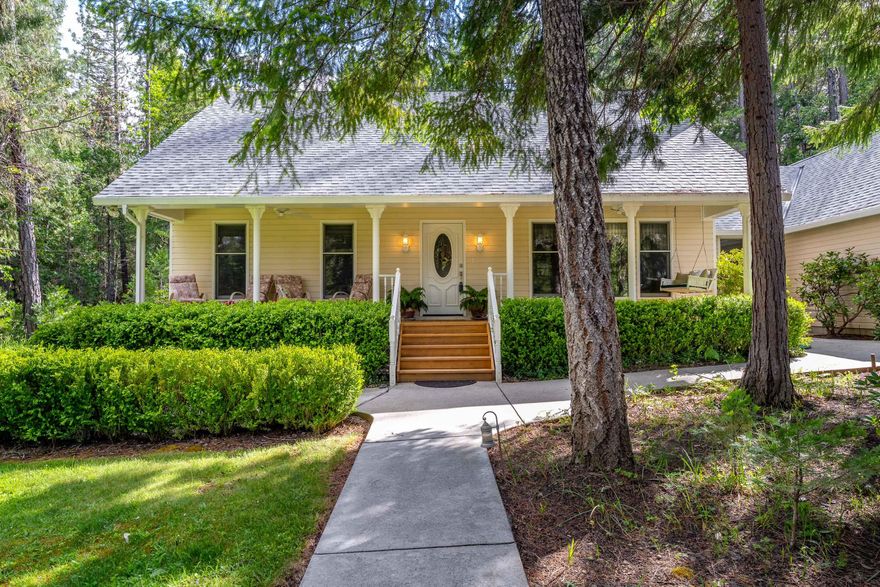 Nestled in the privacy of the trees on 5 acres, this 2,713 sq. ft. custom home features 4 beds, 2.5 baths, a living room, family room, and large bonus room that could be a game room, gym or theater. The split floor plan features 3 beds on the first floor including the large primary suite with large bathroom and walk in closet. The kitchen features custom cabinetry topped with granite/tile counter tops and a gas range. Off the back of the home you'll find a large deck with a screened in room where you can enjoy dinner while watching the wildlife. Attached to the home is a 2 car garage as well as the detached 900 sq. ft. shop which provides ample room for hobbies, projects, and parking. Shop could possibly be converted into an ADU under recent changes to county zoning regs. 18' X 36' RV storage structure. Approx. 12 GPM well with new well pump in 2024. Large attic storage above home and attached garage. Seasonal creek. New Roof on home in 2023! Just 15 minutes to downtown Rogue River.