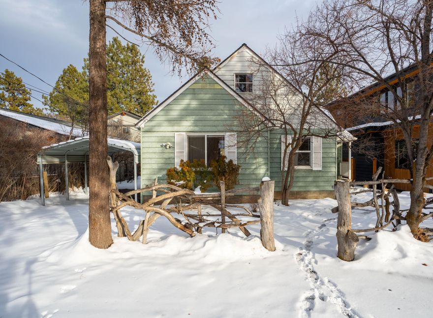 This is what you've been waiting for. A Riverfront property on NW Columbia St. on Bend's West side. Imagine floating the Deschutes river from Old Mill, directly to your backyard! Swimming, fishing, or relaxing riverside without leaving the comfort of home! OK, the lot is perfect, Did we mention there's a house too? The 4 Bedroom, 2 bath home Built in 1945 stands at 1,794 sqft (not including the full unfinished basement!) and exudes all the charm of its era with built ins, real wood floors in the living room and a WALL of floor to ceiling windows to maximize your view of the River. 2 bedrooms and a full bath on the main level, 2 additional bedrooms with a 2nd full bath upstairs, as well as a private balcony off the Eastern guest bed providing additional incredible views of the River. Updates include a Natural gas forced air furnace and hot water heater along with a newer roof. Live in the home, or build your dream home... Opportunity awaits with this one of a kind Bend Oregon property.