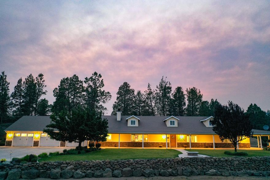 Beautiful 74+ acres with irrigation and custom home. This property offers 34+/- acres of irrigation @ 3 acre ft per acre from onsite well, wheel lines, 3-car garage, barns, workshop, and RV hookup.  The custom 3 bed/3bath home features an open concept kitchen, dining and living space with a large granite top island great for entertaining. Granite counter tops, stone floors with radiant heat, knotty alder cabinets, Wolf range and a sub zero refrigerator makes this an ideal kitchen. A spacious master bedroom suite has a soaking tub, dry sauna, walk in shower and walk in closet.  This home is complete with an office space, laundry room, pantry and a bright sun room.  The second home is a remodeled 2bed/1bath with 2 car garage. The land is set up with wheel line irrigation, currently haying orchard grass. Fenced and cross fenced for rotation. Barns for storage and animal stalls with corral.