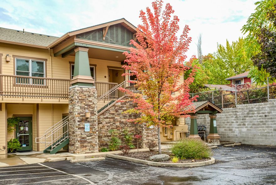 Well maintained, spacious and bright end-unit condo with views of the mountains to the north.  Once upstairs, the versatile open floor plan is all on one level.  There's a bonus nook off of the entry, kitchen overlooks the dining and living room areas and there are three good-sized bedrooms all separated from one another.  The large master suite has a walk-in closet and private bathroom.  There is a designated covered parking spot and a private storage unit.