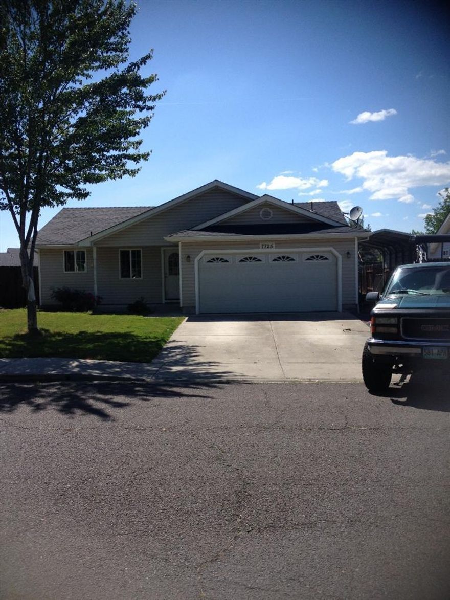 Price Reduced!! This will go fast! 2003 Built, this 3 bed 2 full bath home will have new carpet within two weeks, has split floor plan and a roomy feel! Clean and move in ready within 2 weeks, a perfect home for the 1st timer or investor. Fresh topsoil coming to the back yard! Lots of storage and workshop room with the 10x 20' shop and 8 x 12' shed. Kitchen & dining areas flow right into the livingroom. Large concrete back patio and plenty of room for a back lawn.