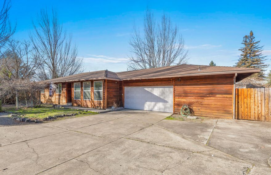 A beautiful 4 BD/3 BTH ranch-style home equipped with a pool, RV parking and potential ADU in East Medford! Located in the Lone Pine school district and offering plenty of privacy with a long, private driveway, this home has been wonderfully maintained with recent updates throughout. The living room brings a sense of uniqueness with brick accents, newer flooring, vaulted ceilings and large windows allowing plenty of natural light to flow throughout the home. The kitchen includes beautiful rough edge granite countertops, bar seating and plenty of storage space! The spacious 4th bedroom is located off the garage and offers plenty of privacy, perfect for a home office or could easily be converted into an ADU! The backyard is perfect for entertaining company with an in-ground pool equipped with a hot tub, a large deck and plenty of shade. This property also has RV parking potential! With so many features this highly desirable home won't last long, don't miss it! Call today for a tour.