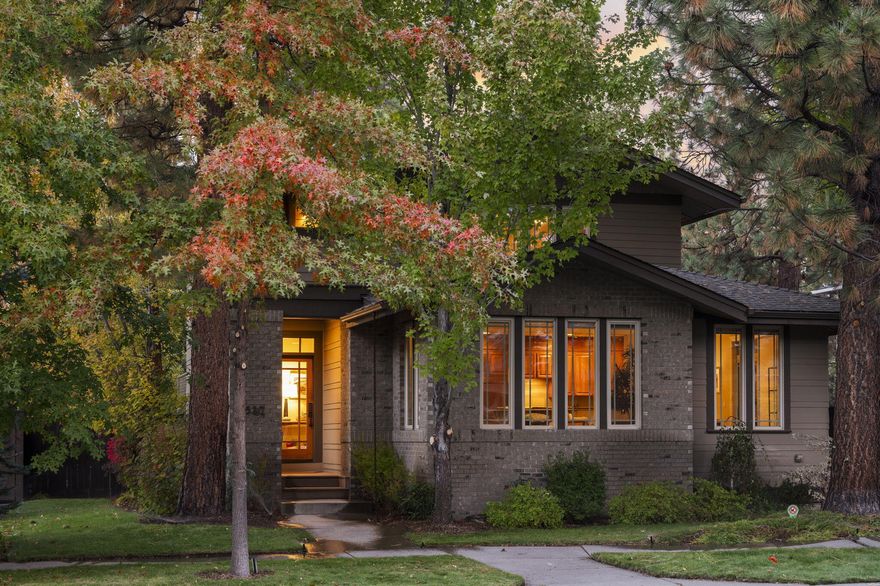 Northwest Crossing- an award winning neighborhood in Bend, Oregon. Main floor with primary suite, solid hardwood flooring, tall windows galore. Two outdoor living areas- Off the dining is a large, fenced patio with lush landscaping and privacy. Additionally, another outside area with grass lawn, hot tub, and fully fenced. A rare two-yard property in NWX. Upgrades continue- wool carpet upstairs, remodeled bathrooms. Vacu-Flo Central Vac and Hunter Douglas blinds. Home has two workspace options- one with it's own deck. Large garage has epoxy flooring, climate controlled wine room and hot & cold spigots. Rachio installed- an app controlled sprinkler system. Hidden driveway has parking for additional 3 cars. Home is low-maintenance so more time to enjoy the eateries, parks and Farmer's Market in Northwest Crossing.