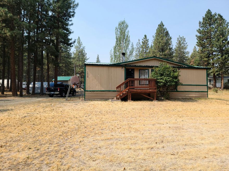 Well maintained and ready to move in. 3 bedroom 2 bath home on an acre lot. Home comes partially furnished and is being sold as-is. Third bedroom is small and accessed through the master, would make a great office or nursery.
