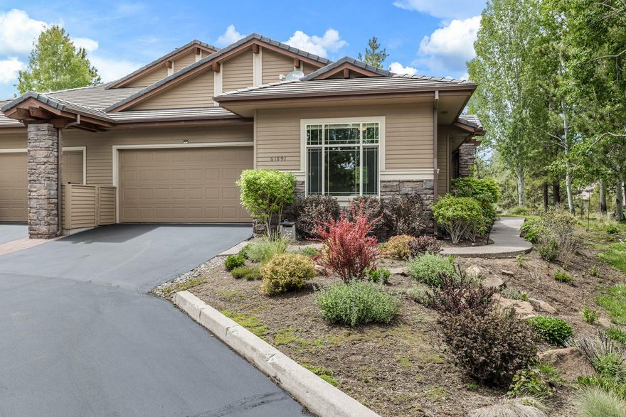 One of the most sought-after single level townhome floorplans in Broken Top, situated in a wonderfully private corner location of Whisper Ridge. A welcoming walkway leads to the side entry that opens to the cheerful great room surrounded by windows overlooking the park-like views.  Kitchen has been recently upgraded w/ an extended butler's bar, glass fronted cabinetry, granite counters and wine refrigerator. Spacious primary suite has private access to patio and a lovely, remodeled bath. French doors open to the serene office w/ a built-in murphy bed that instantly converts the space into an ideal guest room.  A full en-suite jr. primary suite on the opposite side of the home enjoys privacy and golf course views. Spacious two car garage provides plenty of room for cars, bikes and outdoor gear. You are just a short stroll to the Broken Top clubhouse for enjoying a gourmet meal, a little fly-fishing on the lake or a round of golf and a few minutes' drive to the slopes of Mt. Bachelor.