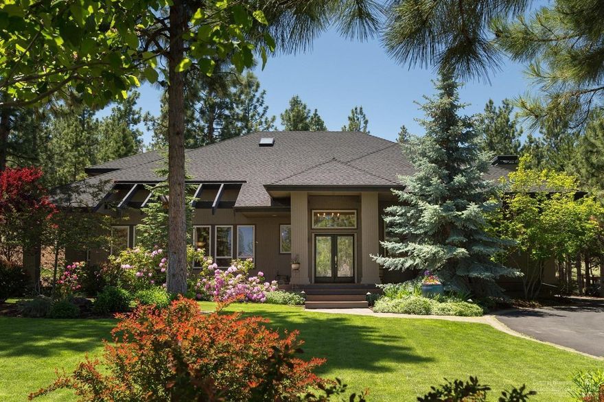 Stately grandeur w/sophisticated contemporary architecture are visible you approach this wonderful home. The grounds are meticulously maintained and alive with blooms. Backyard is a private paradise for tranquility & relaxation w/outdoor gas BBQ, fridge & fireplace. Don't miss the stunning impressive water feature & accent that make this exteriorscape so special. Interior opens from gorgeous entry foyer to spacious great room concept with arched openings, high ceilings & modern décor' fixtures. Open floor w/gas fireplace provides great separation and flow from master, kitchen & guestrooms. Impressive Island kitchen w/massive storage and breakfast bar. Well-appointed Master & Ensuite on main. Large bonus room could be media room use your imagination. This home offers all the best of Awbrey Butte and truly provides a very special living environment where entertaining is a dream. Beauty surrounds you from every angle of this wonderful home.  This is your new Remarkable home.