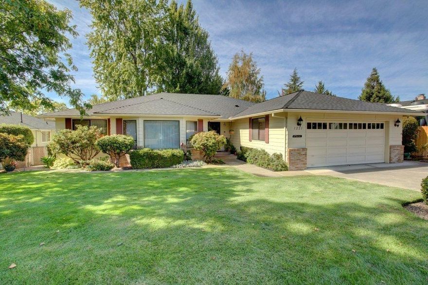 Immaculate in every way. Single level ranch-style home, open and spacious with formal living and dining including family room with fireplace The large trex deck runs almost the entire length of the house, and looks over the beautifully mature landscaping and large private backyard. Ideal family home with plenty of room for everyone. Only one owner. This home offers spacious rooms with indoor wash and dryer, double vanities in one baths and ceramic tile. The other bath has a walk in shower and walk-in closet in the master suite. There is a 2 car attached garage, and in ground sprinklers. Newer roof in 2005.