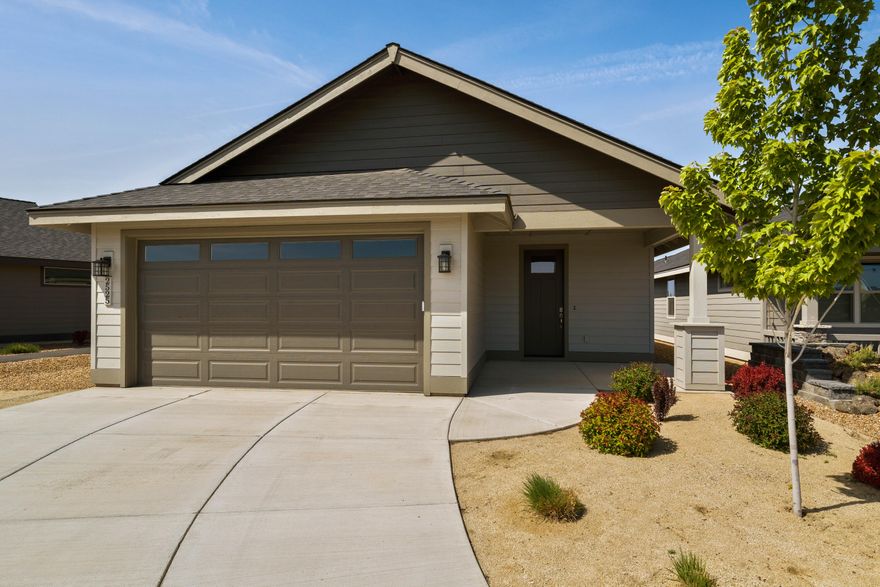 Inviting and thoughtfully designed home featuring a spacious bedroom plus a versatile den or guest room. Bright open-concept living area with a gourmet kitchen offering a large peninsula, quartz countertops, and stainless appliances. Enjoy outdoor living on the covered patio. Located in a 55+ gated community with a new clubhouse under construction featuring an indoor pool, pickleball, gym, bocce, and second floor observation deck. Close to trails, golf, dining, and shopping. Move in ready!