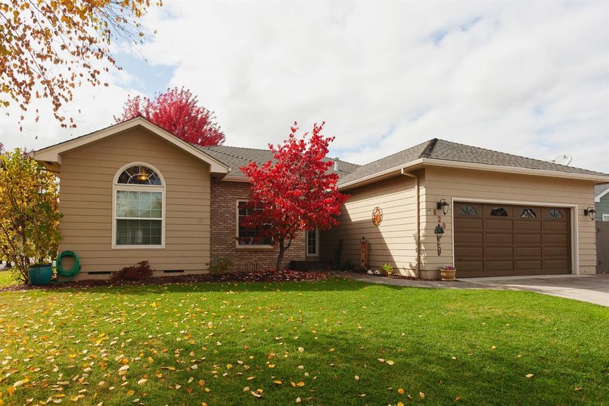 Fantastic neighborhood located in Central Point East. One level 3 bedroom, with an office that could serve as 4th bedroom or office. Vaulted ceiling in living room with corner fireplace, slider to back yard, and hardwood floors through entry, kitchen & dining area. Master bedroom has a soaking tub, double sinks, and walk in closet. Beautifully landscaped backyard, with large patio, equipment storage unit, and a concrete 12' x 40' RV parking space. Finished two car garage, off street parking, and stamped concrete driveway.