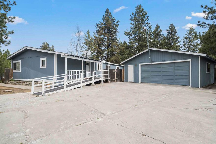 Enjoy this updated 4 bedroom manufactured home with a separate garage. Newer roof and updates throughout. A very tidy property awaiting a new owner.