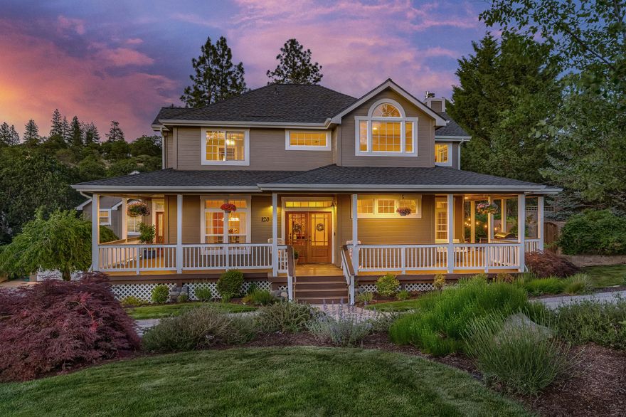 This gorgeous custom-built home rests on a .50 acre in a desirable neighborhood located in the beautiful hills of Ashland & only moments from Downtown.  Included is a 736 sq ft 1 bedroom guest home, oversized 3 car garage, a private backyard w/in-ground gunite solar heated pool, a lg deck, wrap around porch, nice landscaping & RV parking. The kitchen offers an abundance of natural light, quarts countertops, island, dbl ovens, stainless appliances & lg eating bar. The Master suite is located on the main level w/an office/sitting area, dual vanities, water closet, bidet, tile shower and flooring + a beautiful new soaking tub! Entertain your family and guests in lg formal dining room and a cozy living room w/ high efficiency gas fireplace French doors leading to a covered porch & a beautiful water feature. The upper level offers a family room, gas/wood fireplace, 2 lg bedrooms + 2 full baths. Mountain views, beautifully landscaped, ample room for gardens & extra storage.