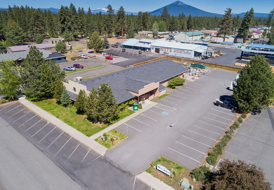 Just off the main drag in historic downtown Sisters OR sits this unique property. The inside of the building is complete with 14 offices, a kitchen, and break room. The warehouse area is over 5,000ft and includes a loading dock with roll up doors. The building sits on a 1 acre lot that includes a fenced storage area and large parking lot w/ 47 spaces. There is room to add an additional 9000+ ft of building footprint on this property. This one won't last long, schedule a tour today!