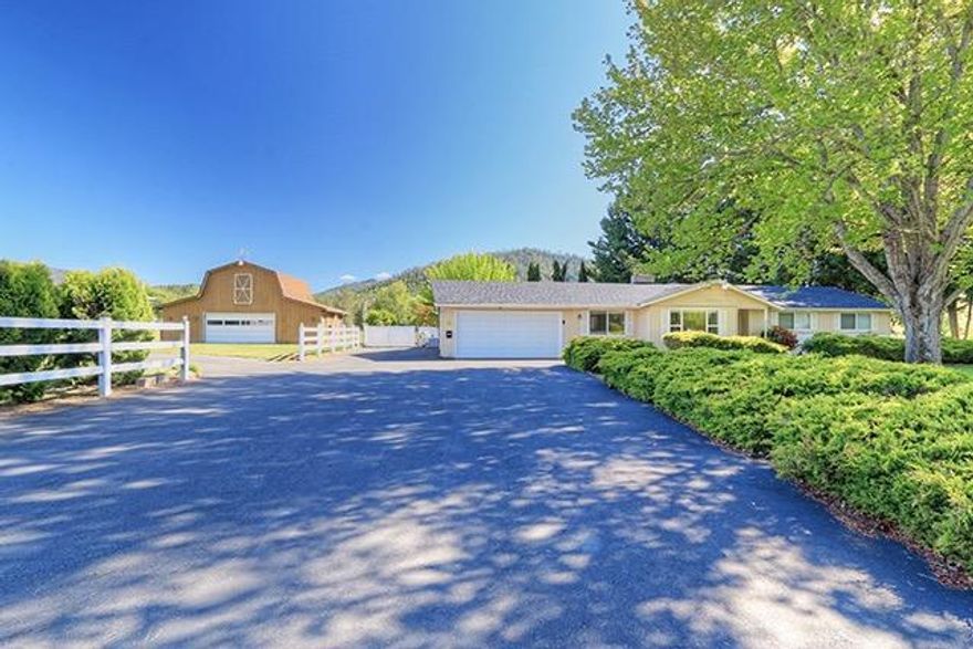 Located in the Desirable Jerome Prairie area, this Wonderful Three Bedroom, Two Bath, 1588 sq. ft. Home sits on 3.71 Level and Usable Irrigated Acres. Bright, Spacious Kitchen boasts Beautiful Views of the Pasture & Mountains with lots of Cabinets and Counter space. Area adjoining Kitchen could be used as Dining or Sitting Area, with a Slider out to the Back Patio. Living Room with Brick Fireplace and Formal Dining Room create a nice Open living space. Master Bedroom also has a Slider out to the Back of the Home. In addition to the Attached Two car Garage with shelving and cabinets, there is also a Detached One car Garage and Shop for additional Parking, Storage or Hobby Area. Large Barn with Space for your Riding Mower or Room for Animals. Fully Fenced Backyard with mature Landscaping and Covered Patio. Hard to find in Today's Market, this Gorgeous Property has something to Offer for Everyone and won't last long. This one feels like Home!