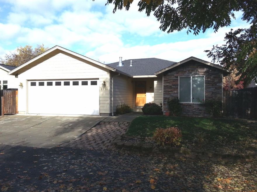 Must see this great home with popular open floor plan located in South Creek Subdivision. A comfortable home with 10 ceiling, fireplace, walk-in closet, covered deck, patio, 2 car garage and more. The home sits on a quiet private street close to Griffin Creek Elementary and South Medford High. Great value for the price so hurry.