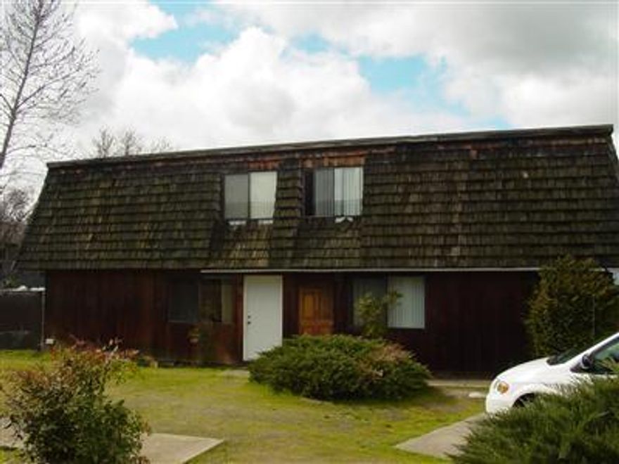 Great East Medford location. This fourplex consists of four 2 bedroom, one bath units. Rents are 2 units - $625, 1 unit $608, and 1 unit $600. Situated near schools, shopping and bus line. Each unit has a carport and a storage room. Washer and dryer hookups are in all units. Great price for four units.