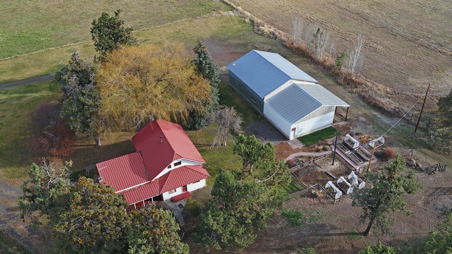 Classic Tumalo farm property totaling 34.82 acres with 18.5 acres of irrigation rights. Quality Easterly views. There is also a 2,958 Sq. Ft. shop/farm building and a hay cover on the property.