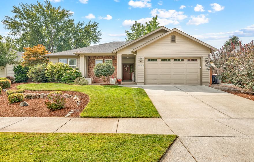 Welcome to this beautiful three-bedroom, two bathroom home with lots of upgrades. Wood floors in the living room opens to a cozy gas fireplace. Vaulted ceilings, open floor plan and beautiful stamped concrete patio make this home perfect for entertaining. Well landscaped front and back yard. Home is close to shopping, hospitals and restaurants. Come make this your new home.