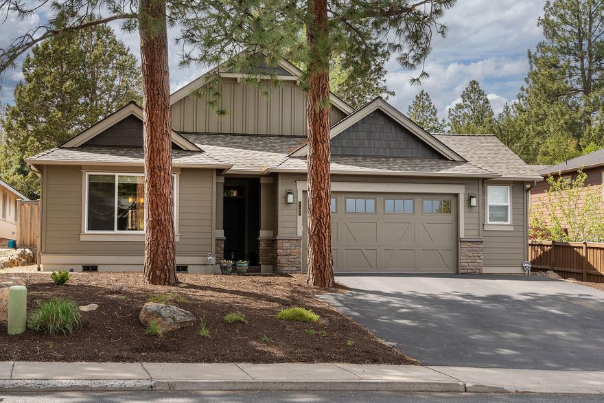Exceptional style, quality and location single level home on large private yard in the heart of West side Bend. Just blocks from downtown, trails, shopping, dining, and concerts—offers the best of Bend in a highly walkable neighborhood.
Step inside to cathedral ceiling, sun-filled great room with a cozy fireplace, seamlessly connected to the chef's island kitchen featuring professional series appliances and ample prep space.
With 3 bedrooms and 3 full bathrooms, including a luxurious primary suite with spa-inspired bath with 6' soaking tub, double vanity, and expansive walk-in closet, plus a junior suite for guests or multigenerational living, comfort meets versatility. Enjoy the large, private, professionally landscaped yard, designed for low maintenance—perfect for travelers or simply want to relax and entertain. An oversized 2-car garage with a shop area. Exploring the vibrant culture of downtown Bend or unwind in your contemporary retreat, a rare blend of style and convenience.