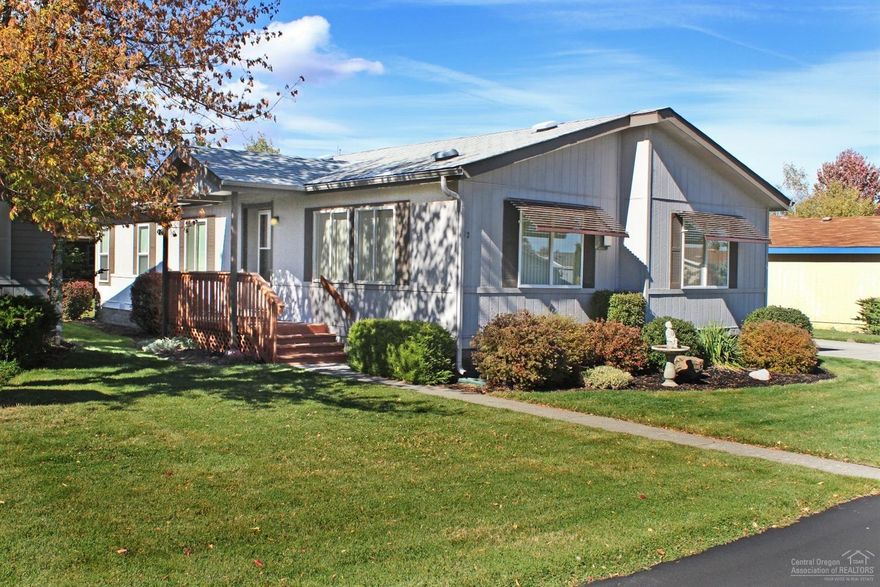 Wow! Includes a Home Warranty! Must see this sparkling gem in Beautiful Snowberry Village. Clean, tidy, pet free single level home. Close to Medical & Shopping. Free standing gas stove. Ceiling fan. Skylight. All appliances inc. 2006 Heat pump & water heater; 2013 Washer/Dryer/Fridge. Very private patio. Insulated & sheet-rocked 2 car garage. Space rent $460/mo includes water, sewer, irrigation, clubhouse, community activities, snow removal & lawn mowing. RV parking available. Regular Community Events too!