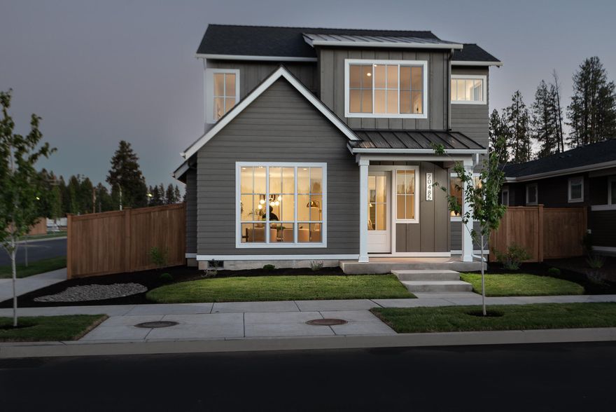 Gorgeous modern farmhouse style home built by award winning Structure Development NW. Featured on the 2022 COBA Tour of Homes and located on a corner lot in SE Bend's newest neighborhood, Countryside. Open floor plan featuring great room with gas fireplace and luxury vinyl plank floors throughout main living area. Spacious kitchen with professional series appliances, oversized island and pantry. Custom cabinetry and solid surface quartz countertops. Modern high end lighting and plumbing fixtures. Private primary suite with tile shower and walk-in closet on main level. Large loft, two guest bedrooms and full bathroom on upper level. Covered front porch and side patio for outdoor living and entertaining. Double-car garage and fully landscaped with sprinkler system.