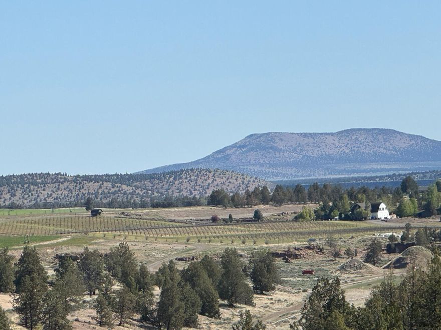 Rare opportunity to live work and play in a recreational community between Redmond and Sisters 5.01 acre EFU parcel in a low density, vineyard oriented community of just nine homesites. Seller will deliver well, septic and power. Borders 30,000+ acres of BLM for unmatched privacy, wildlife (deer,  bald eagles, occasional elk) and sweeping views of the Ochocos, Smith Rock (Oregon's premier outdoor attaction for hiking, sightseeing and rock climbing) and the Cascades. Minutes to Smith Rock, world class fly fishing on the Deschutes & Metolius, and ~30 minutes to winter snow sports.  Convenient access to services, dining and regional events.. Ideal for a vineyard, hobby farm or equestrian property.  Living with elbow room and piece of mind your privacy will be protected, outdoor adventure at your doorstep and 352 days a year of sunshine!  Life doesn't get better than waking every day in Faith Hope and Charity community!