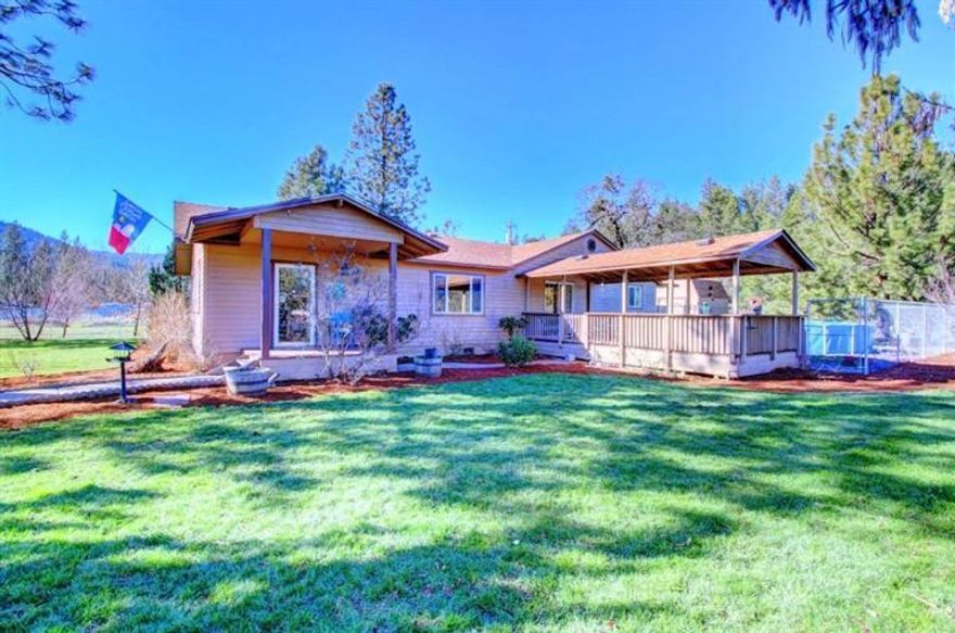 Truly One of a Kind Home & Property! Gorgeous views, fenced & cross-fenced; huge finished/insulated shop w/mezzanine, wood stove/220 power & a beautifully remodeled home w/so many extras & upgrades we could not list them all. Newer roof & fresh paint inside/out, 12x24 deck w/cover is hot tub ready. Custom kitchen boasts new stainless steel appliances, custom cabinets, granite counters, gas range & undermount sink. Enjoy loads of storage, huge inside laundry, forced air heat & A/C and upgraded lighting/plumbing! The living, dining, Master & 2 extra-large bedrooms have ceiling fans, 2nd bedroom has walk-in closet; all this with vaulted ceilings & new vinyl windows throughout. The big master bath has tile floor, tub/shower combo & walk-in closet, & there's a separate office. Enjoy 1.13 acre with separate RV parking with water/power, great well per owner and 6-ft. chain-link fence & entry gate. Finish with mature trees, timed sprinklers, large garden area & fruit trees + 10x12 greenhouse!