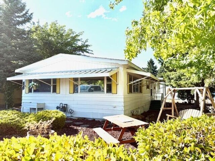 Seller Motivated!  He says he will look at any reasonable offers!! Welcome home to this well maintained 3 bedroom, 2 bath home in the desirable Rogue Lea Estates 55+ Community.  Living Room is very spacious and kitchen in light and bright with a gas stove. It also has lots of storage including a pantry.  Primary bedroom is large and the primary bathroom has a walk-in shower.  The home sits on an oversized corner lot and has storage off the carport as well as an additional shed.