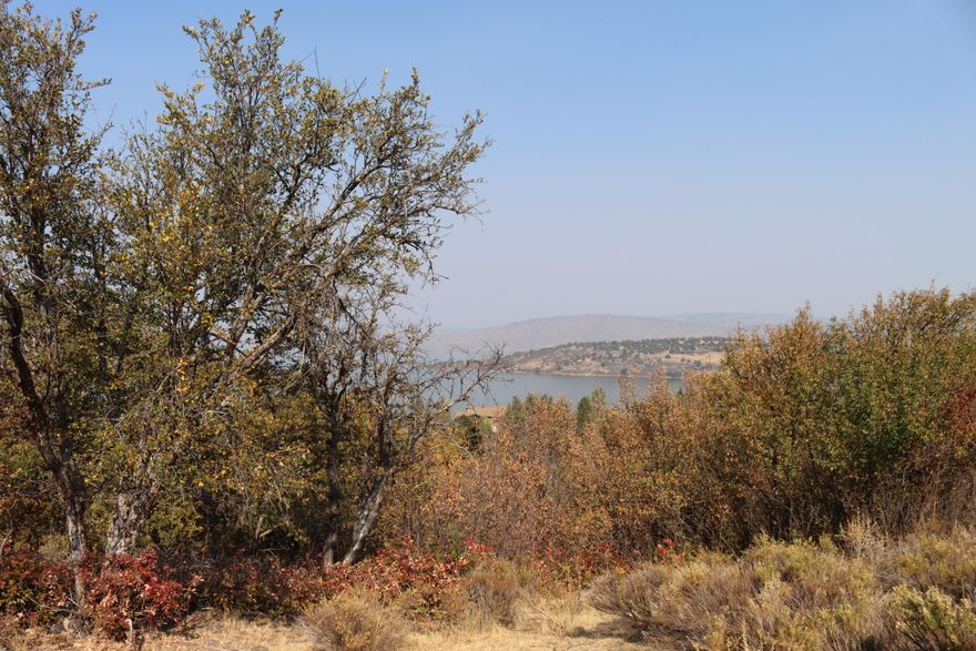 Spectacular lake and mountain views from this 3.41 acre parcel.  One of the largest available at the Running Y Resort