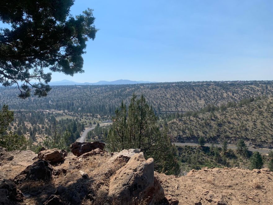 A well maintained, clean and  ready to use build-able lot with 30x40  shop located in a great location of Three Rivers Rec. with  closer proximity  to Lake Billy Chinook.  This property makes for a wonderful camping site for recreational use with plenty of parking  for summer time fun. The longer driveway back gives room to use the property and leads to a   canyon rim which features remarkable expansive views of mountains,twinkling lights of Culver at night and more.  The  large flat gravel pad overlooking the canyon  is the true show piece of the property which would make  a fabulous custom ready  home site! Perc tested , completely surveyed and well graveled. Two appealing   out buildings, one currently used as a bunkhouse with camp kitchen and loft  where the other features water cistern and outhouse facilities. Three Rivers Rec is an off grid gated community with private lake access that has many amenities. Call today for a showing!